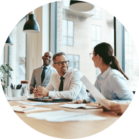 Lenders conversing at a table